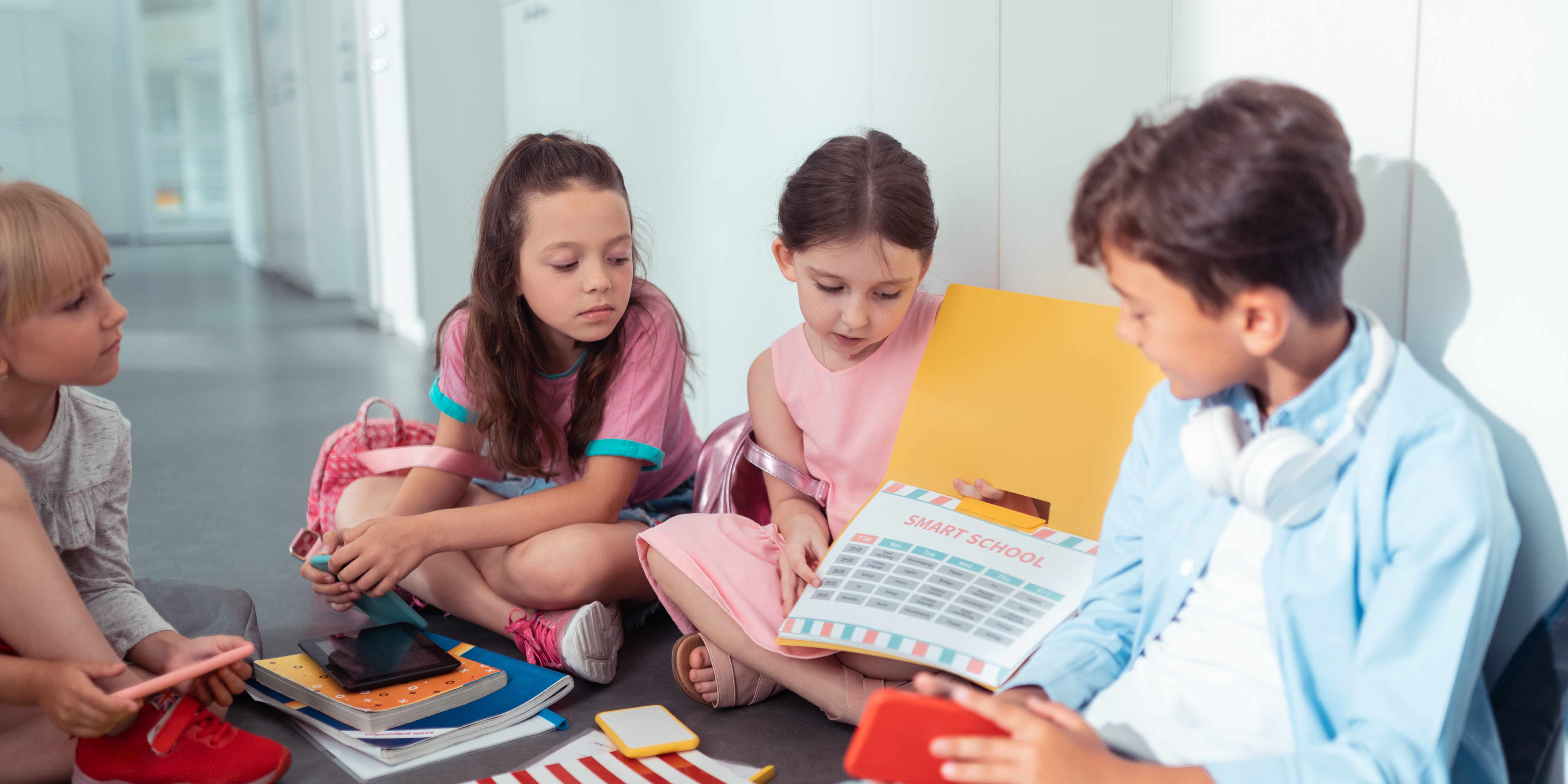 Students looking at a schedule together