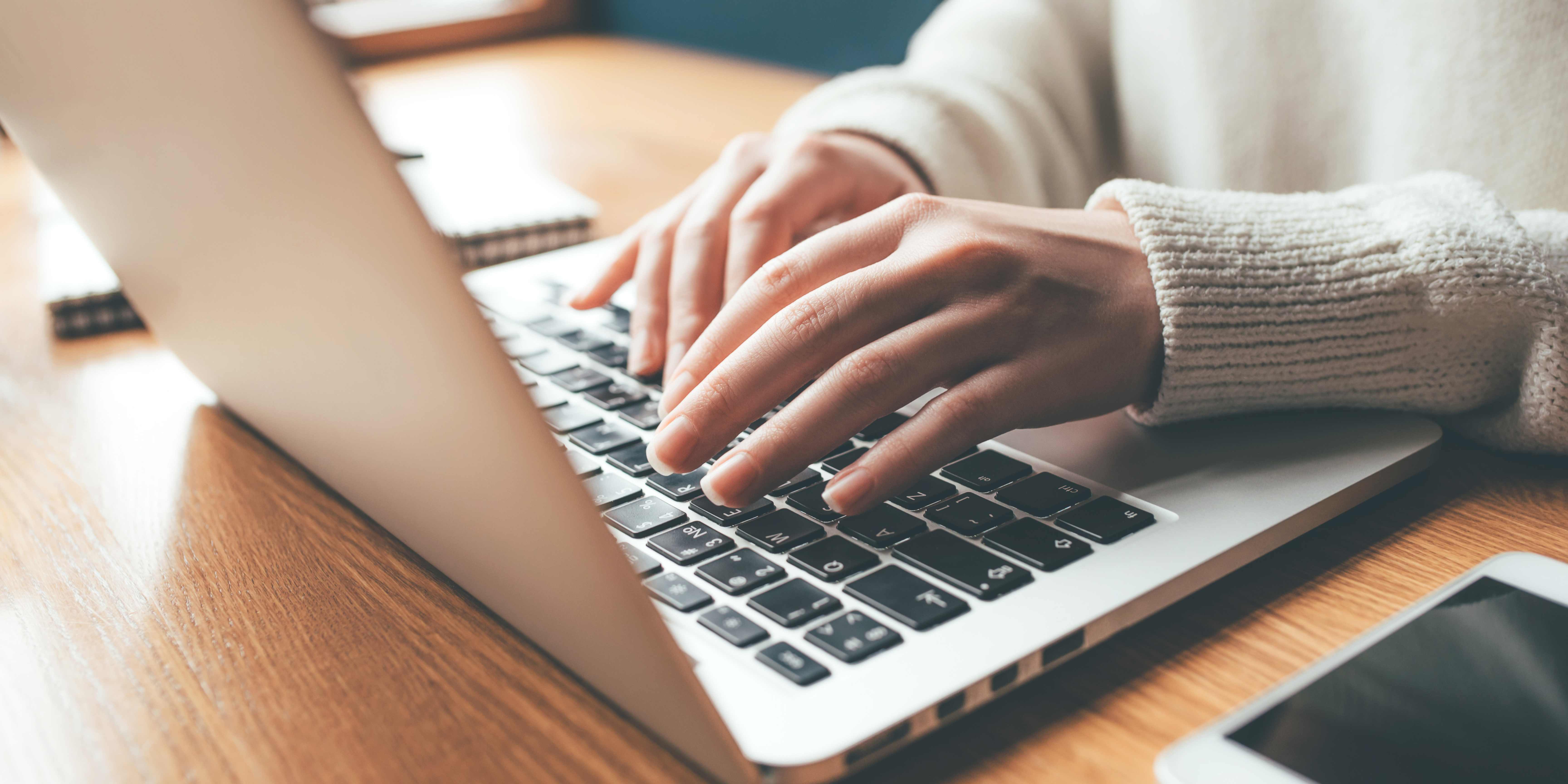 A teacher using an AI tool on their computer